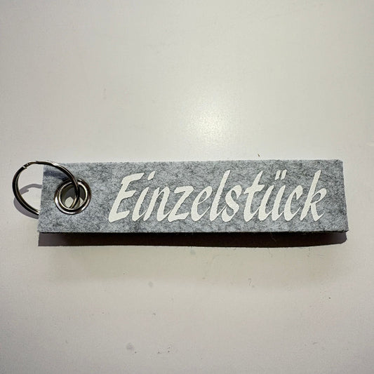 Personalisierbarer Schlüsselanhänger "Einzelstück"